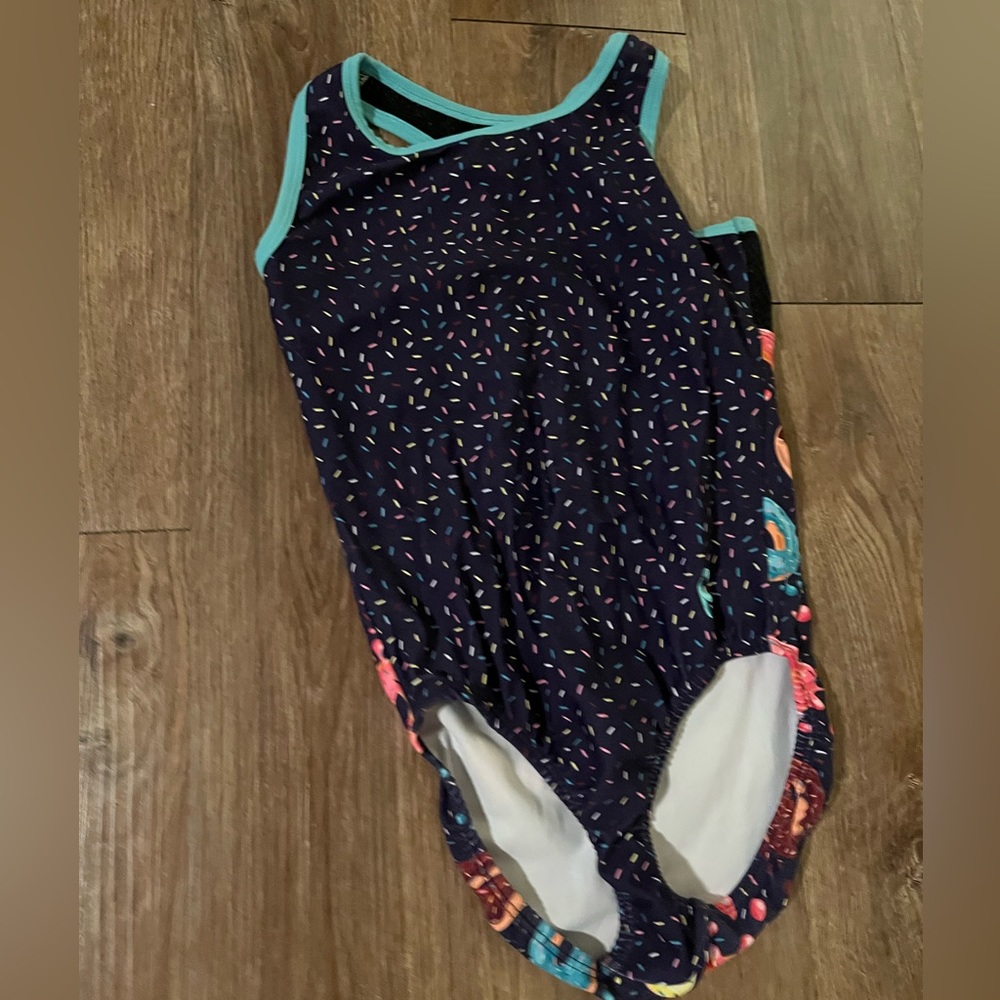 Gymnastics leotard donuts/sprinkles, worn 1-3 times,stretchy, mesh straps.